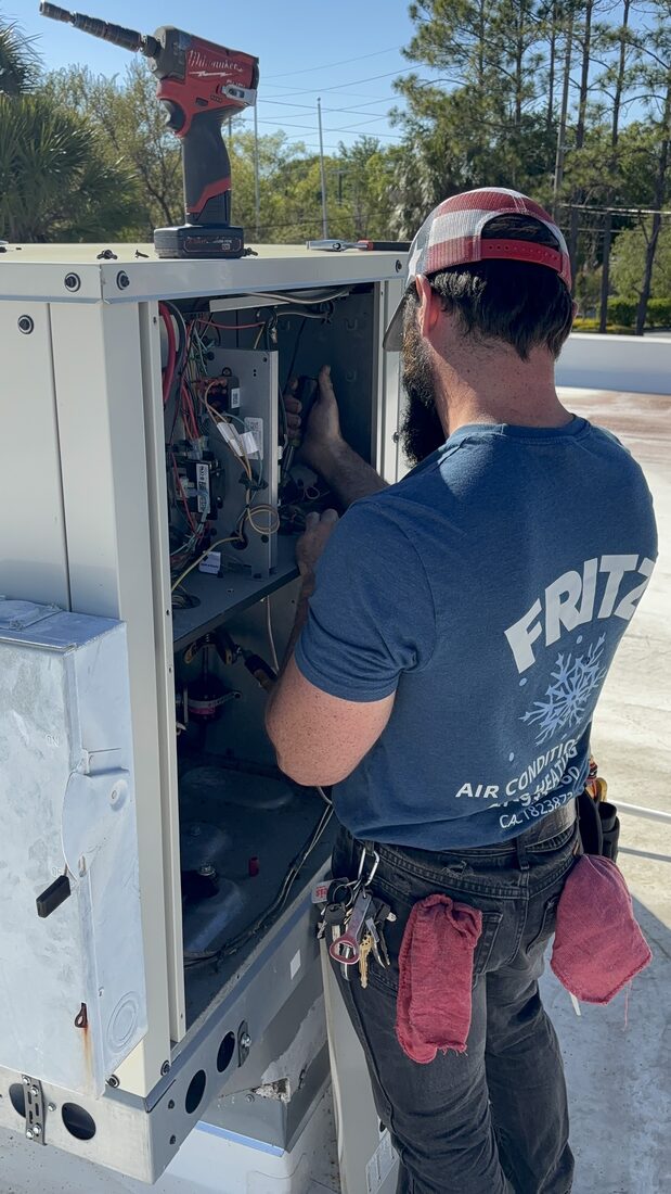 Fritz technician diagnosing a unit